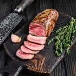 Juicy lamb tenderloin from the air fryer with fresh herbs
