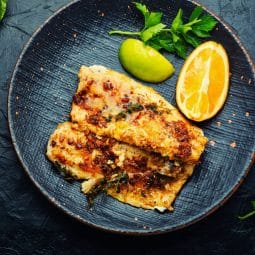 Breaded fish fillet served with remoulade