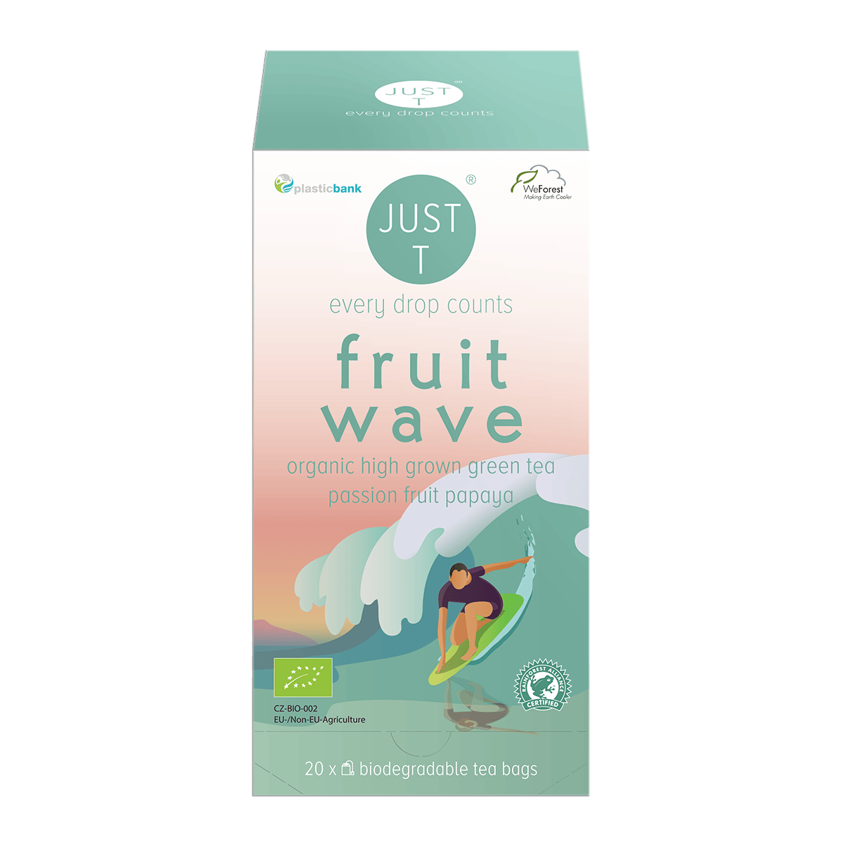 En flot pose Just T Fruit Wave tropisk grøn te med passionsfrugt og papaya på et moderne køkkenbord
