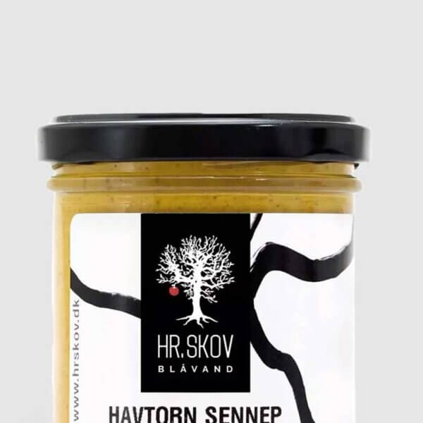 Glas med Hr. Skov Havtorn Sennep klar til servering