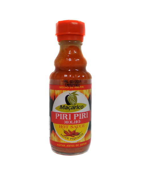Flaske med Piri Piri sauce klar til marinering af kylling
