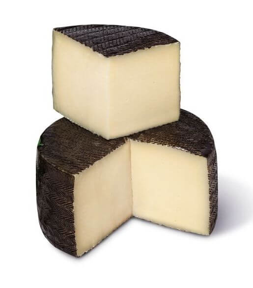 Kile af fast Iberico ost curado lavet på blandingsmælk