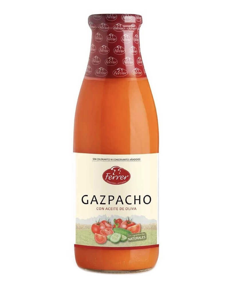 Flaske med rød Gazpacho Ferrer suppe klar til brug