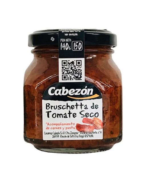 Glas med rød Soltørret Tomat Bruschetta topping fra Emperatriz