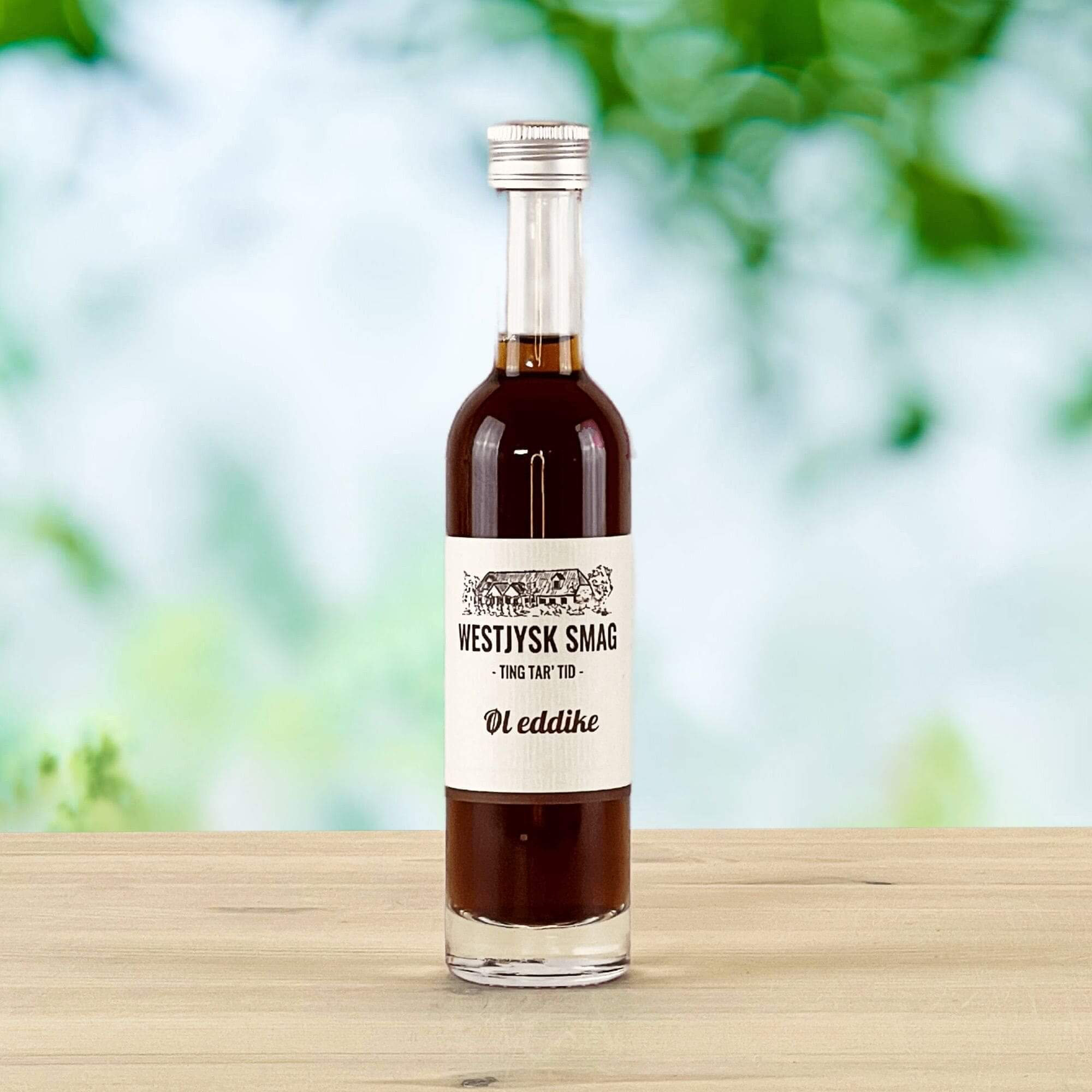 Flaske med mørk gylden øl eddike