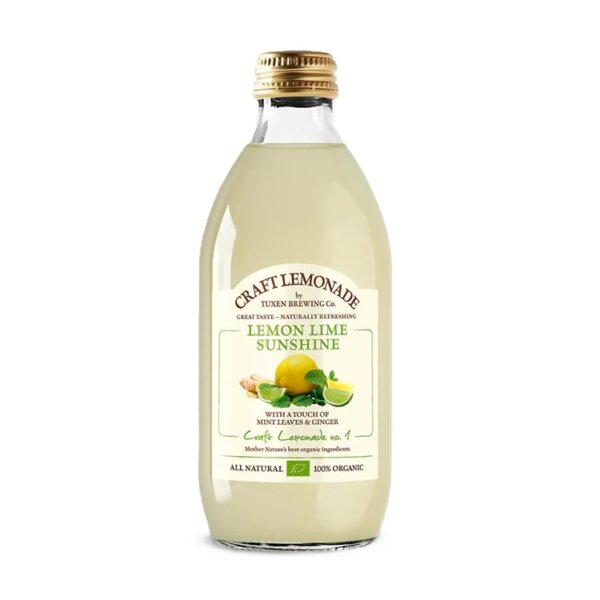 Flaske med Tuxen Citron og Lime lemonade klar til servering