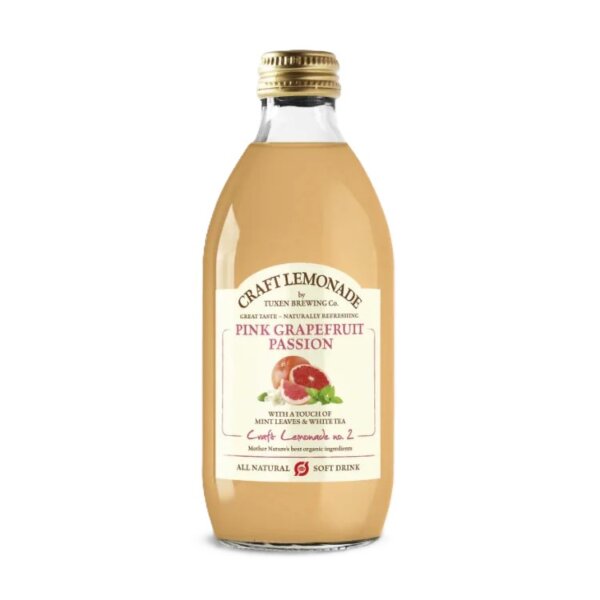 Flaske med lyserød Tuxen Grapefrugt lemonade klar til servering