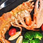 Bogavante Thermidor con relleno cremoso y costra de queso gratinado
