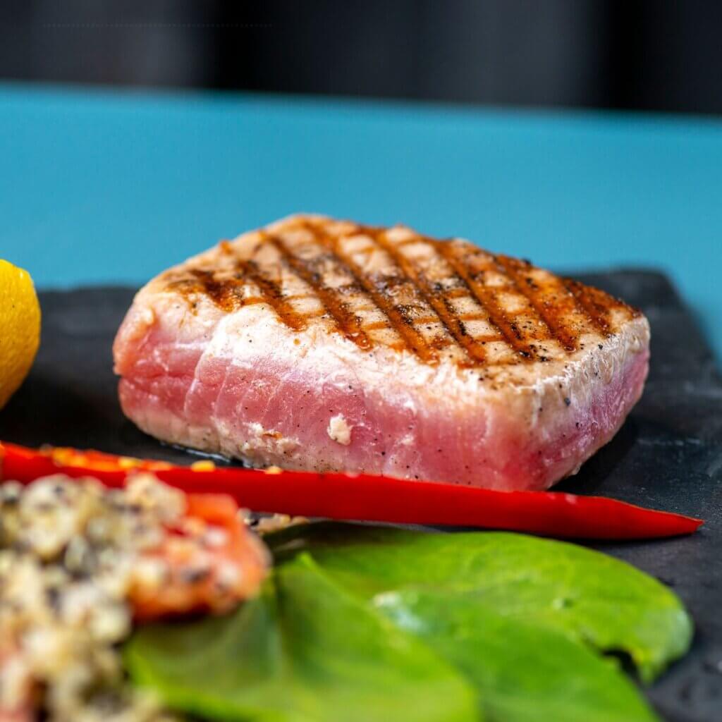 Tuna steak seared outside and red in the middle