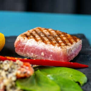 Tuna steak seared outside and red in the middle