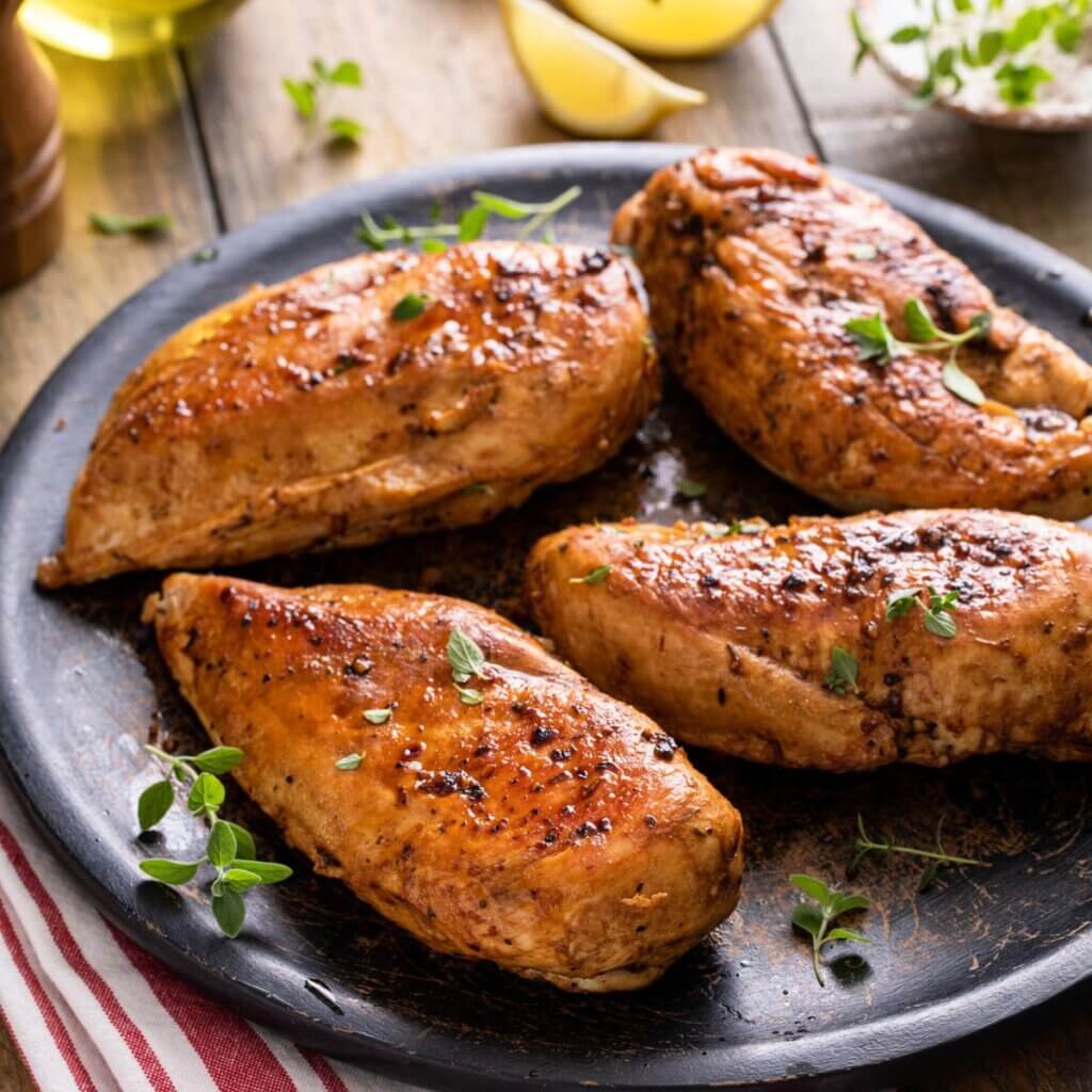 Balsamic-marinated chicken with glossy glaze and herbs