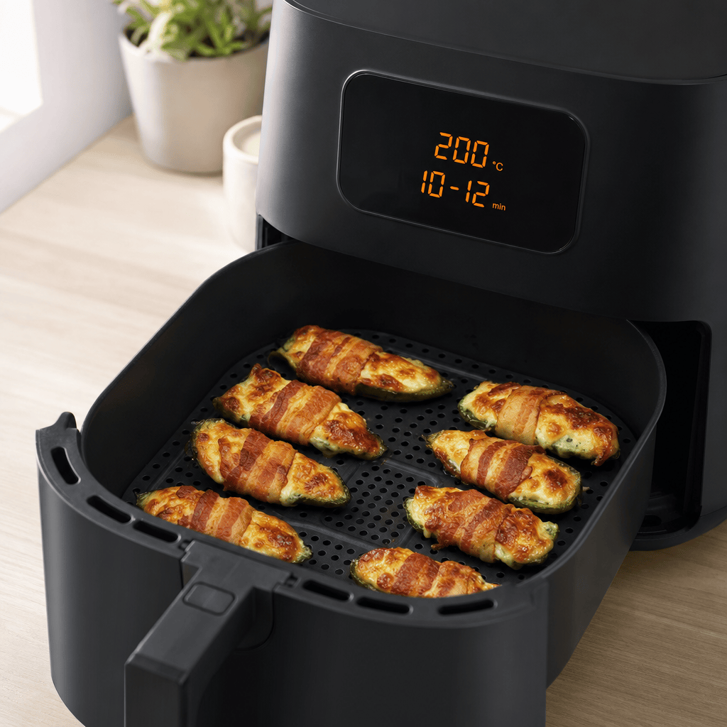 Jalapeno poppers tilberedes med ostesiden opad i min airfryer